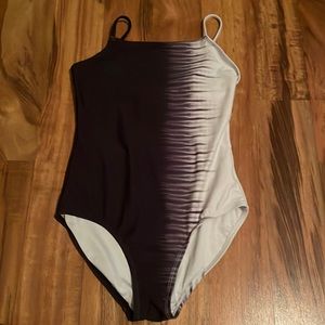 A black and white girls XL one piece swim suit from Old Navy.